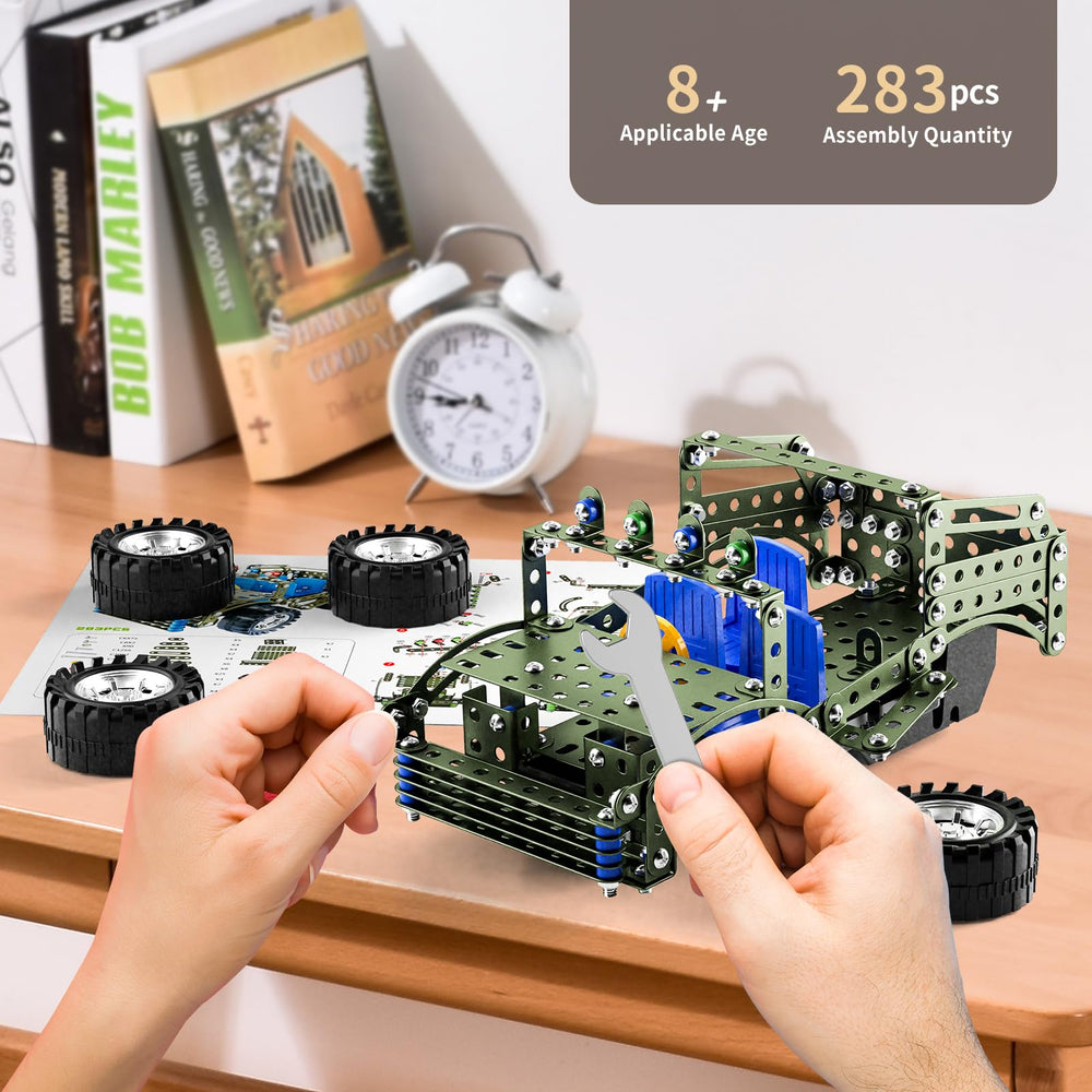 Watudou model truck parts laid out for careful assembly.