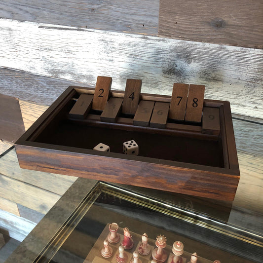 WE Games Shut The Box tiles close-up highlighting 9-number flip tiles.