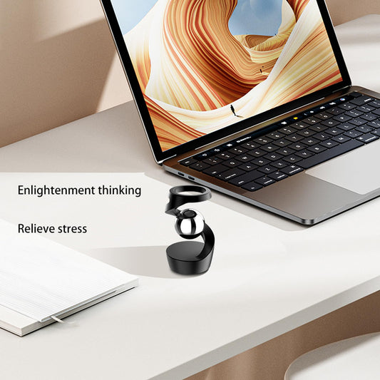 Wecsv kinetic desk toy side view highlights premium metal finish.