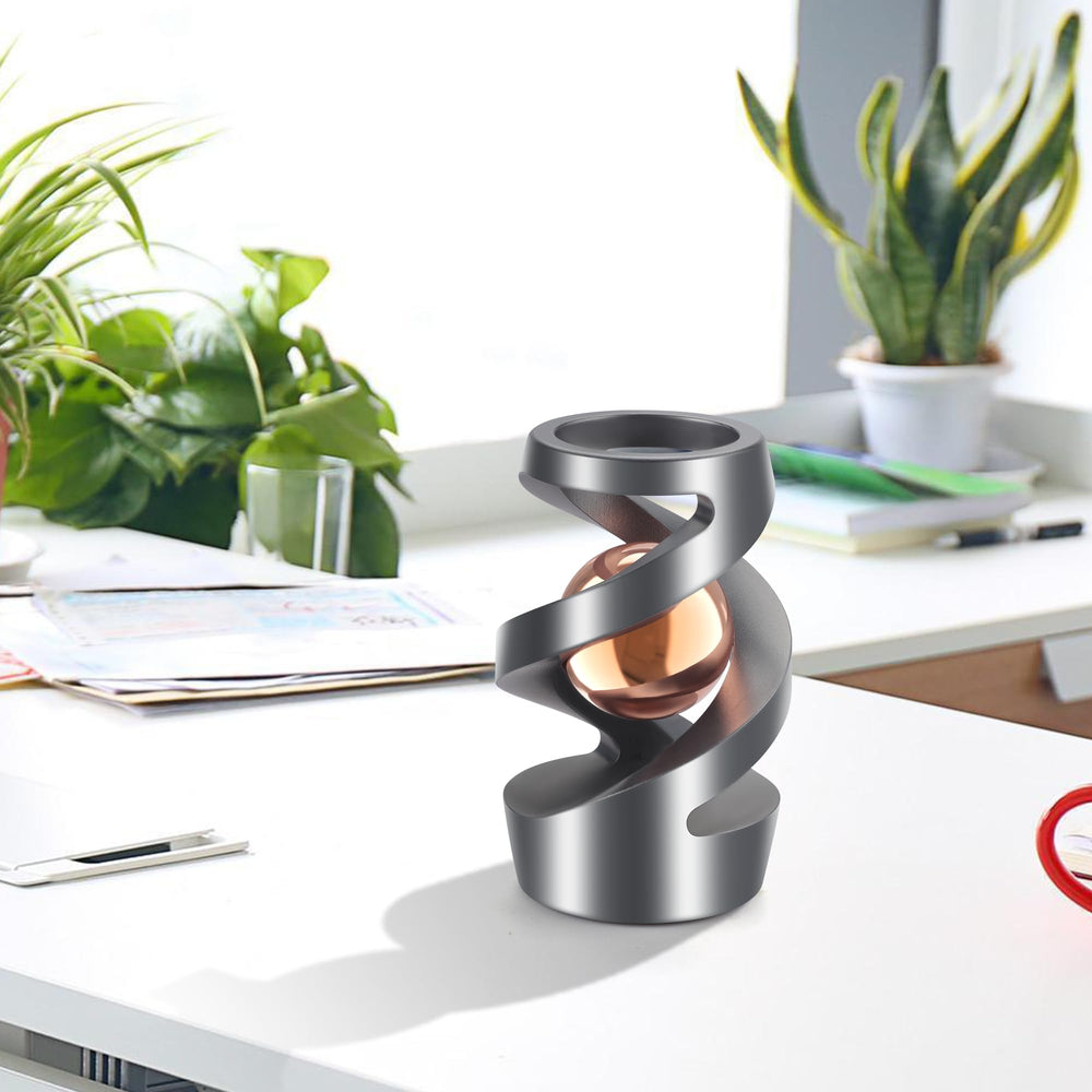 Wecsv kinetic desk toy demonstrates playful motion to brighten a workspace and mood