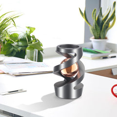 Wecsv kinetic desk toy demonstrates playful motion to brighten a workspace and mood