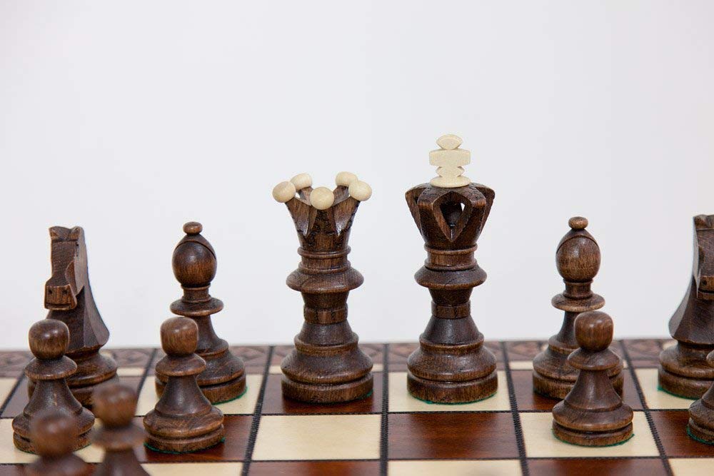 Wegiel hornbeam and sycamore pieces showcase carved details and durability.