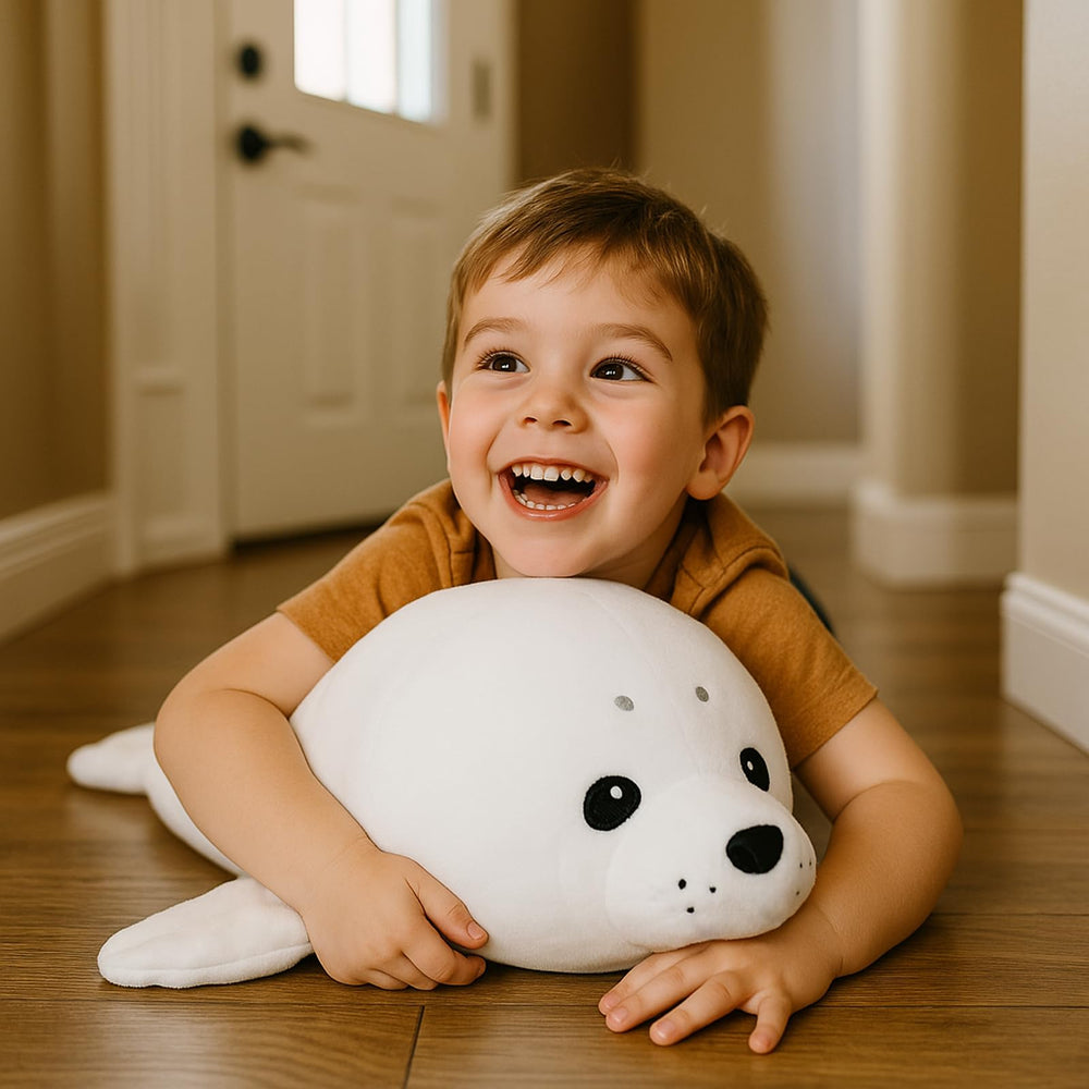 WEIGEDU White Baby Seal Plush Pillow ultra-soft fabric close-up for comforting hugs.