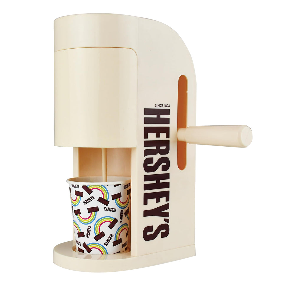 Well Played Hershey's Chocolate Drink Maker pours into a glass for a creamy treat.