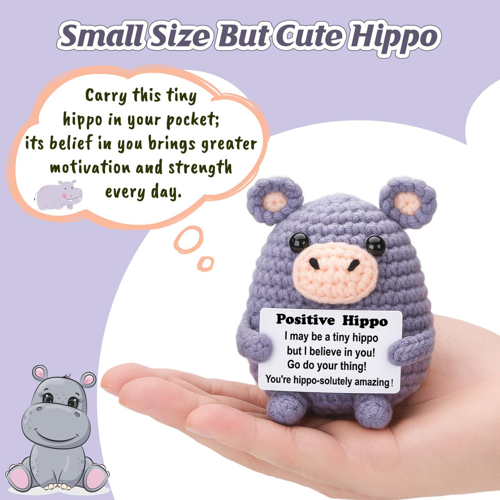 Weming hippo desk buddy perched on monitor shelf for daily motivation