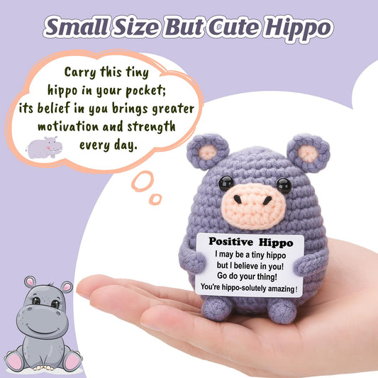 Weming hippo desk buddy perched on monitor shelf for daily motivation