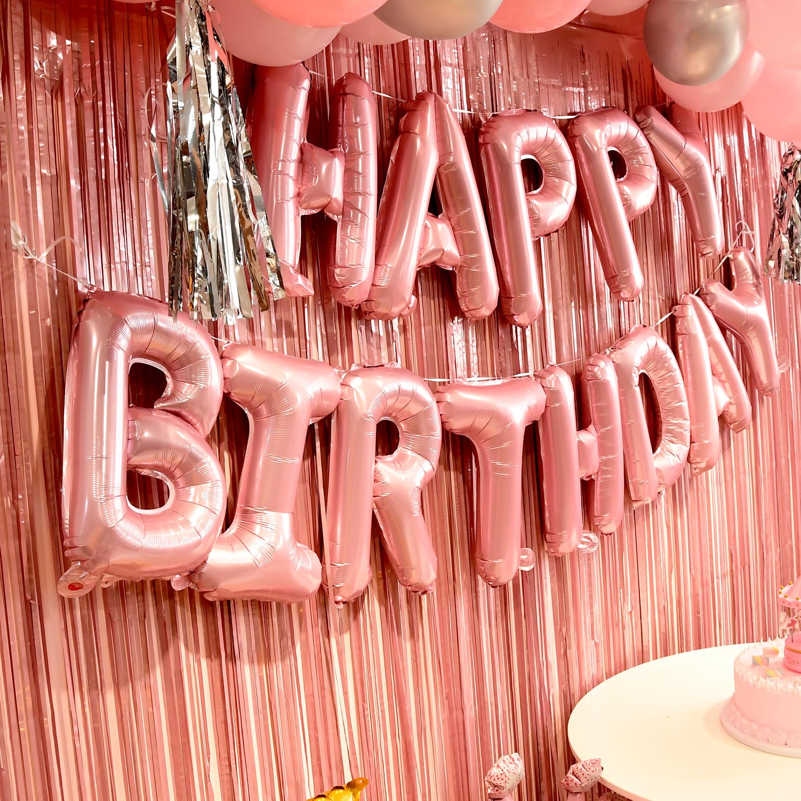 WGFPAIT pink fringe curtain adds a second shimmering backdrop