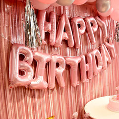 WGFPAIT pink fringe curtain adds a second shimmering backdrop