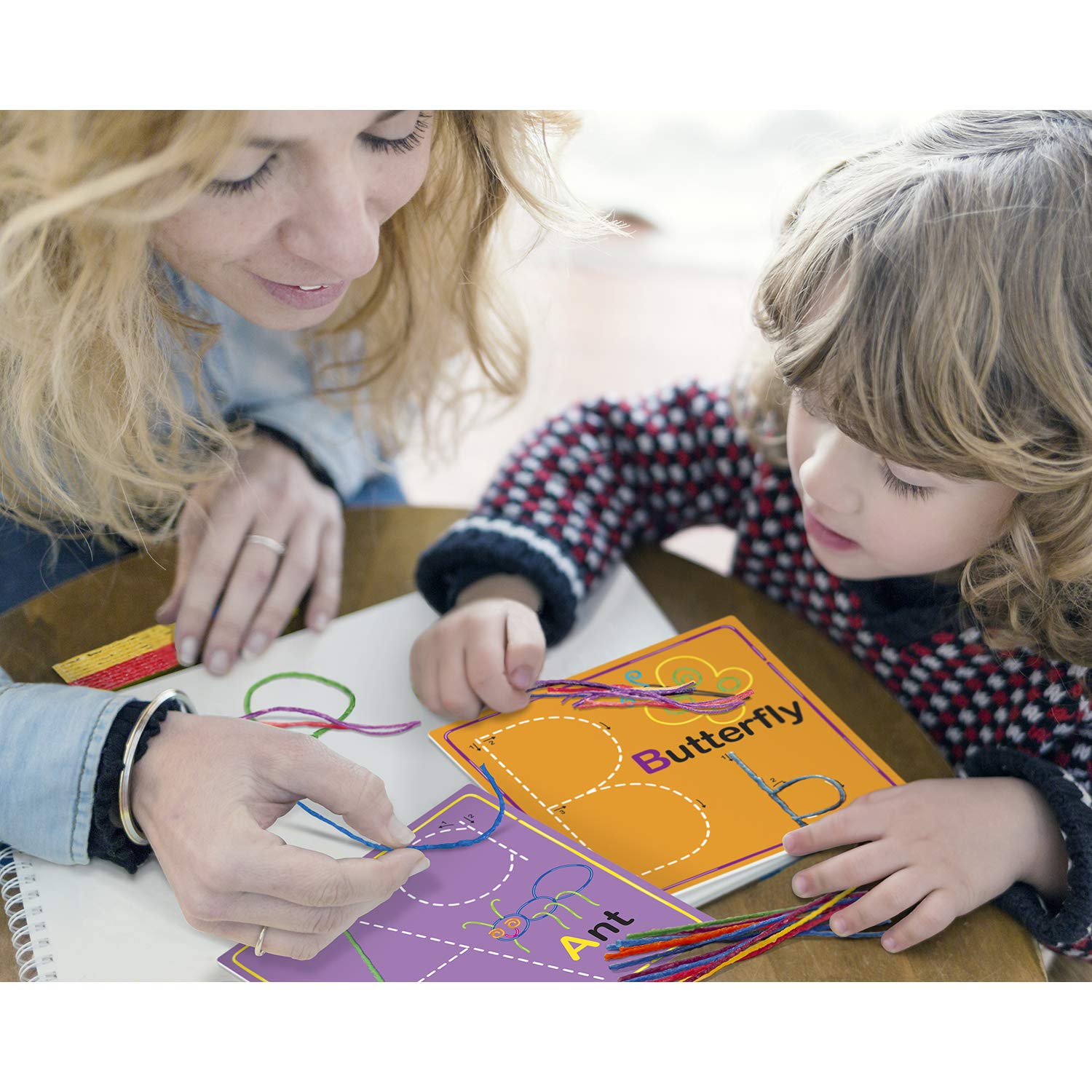 Wikki Stix colorfully illustrated cards support hands-on literacy and word-building activities.