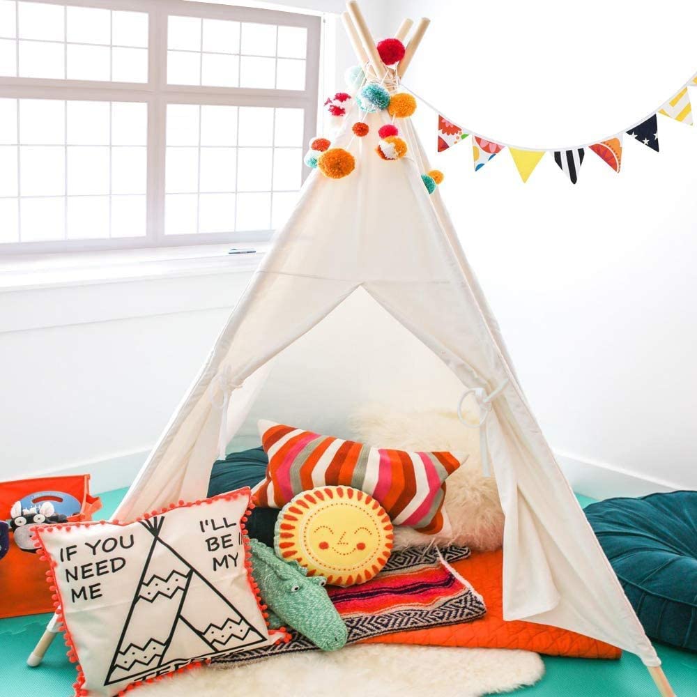 Imaginative play setup with Wilhunter teepee as a pretend cabin