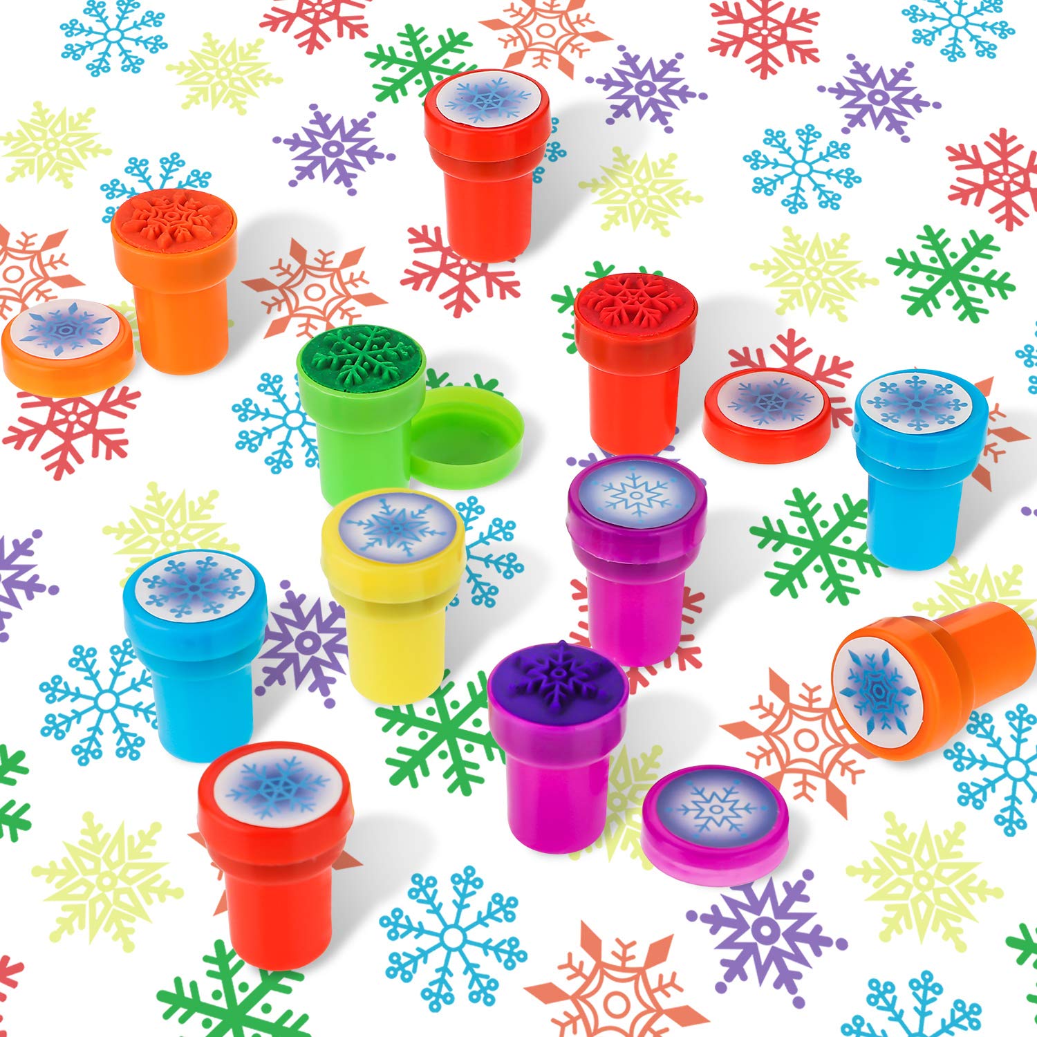 WillBond colorful-inked snowflake stamps create bright, layered patterns for scrapbooks and gift tags.