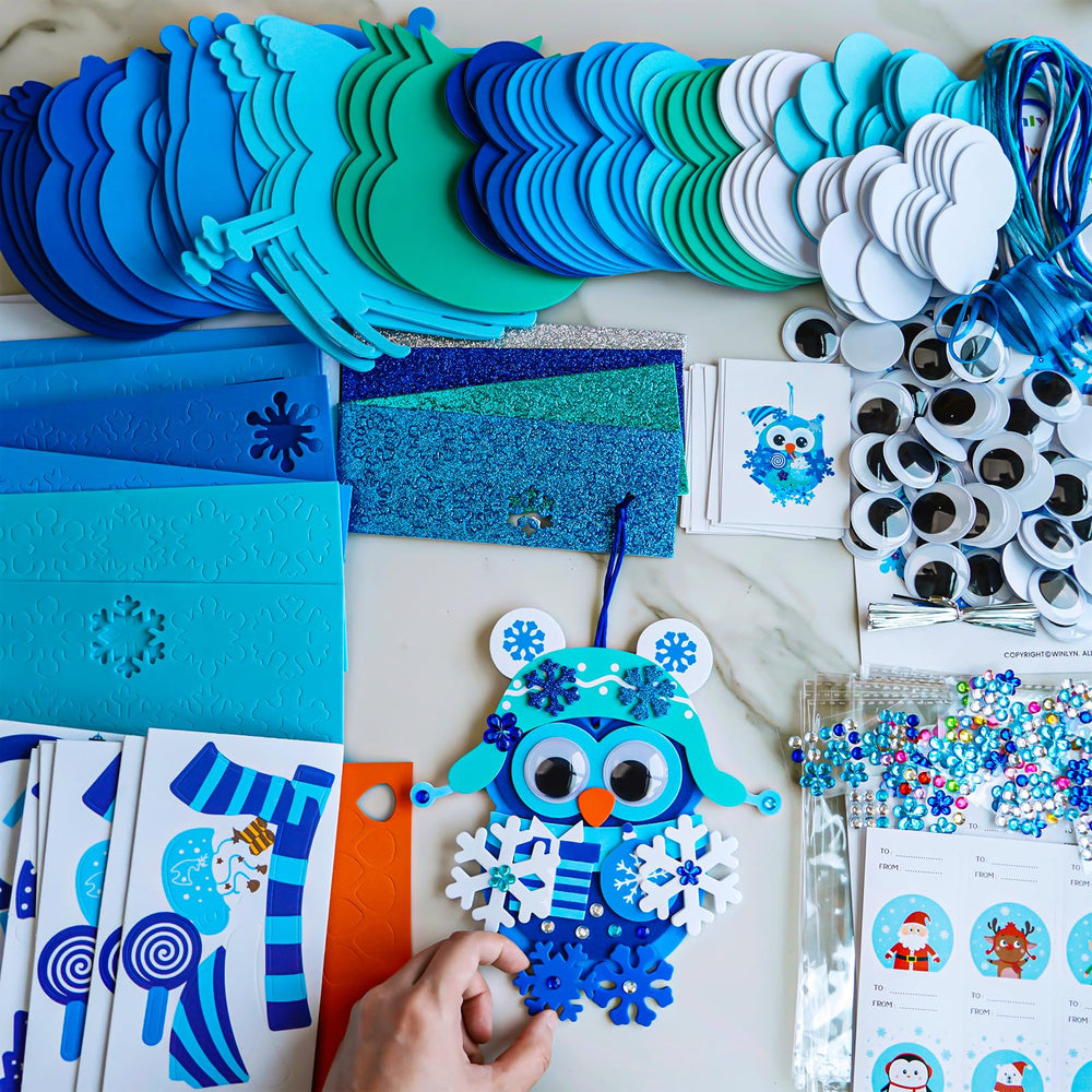 Winlyn beak-stickers provide precise facial features for expressive ornaments.