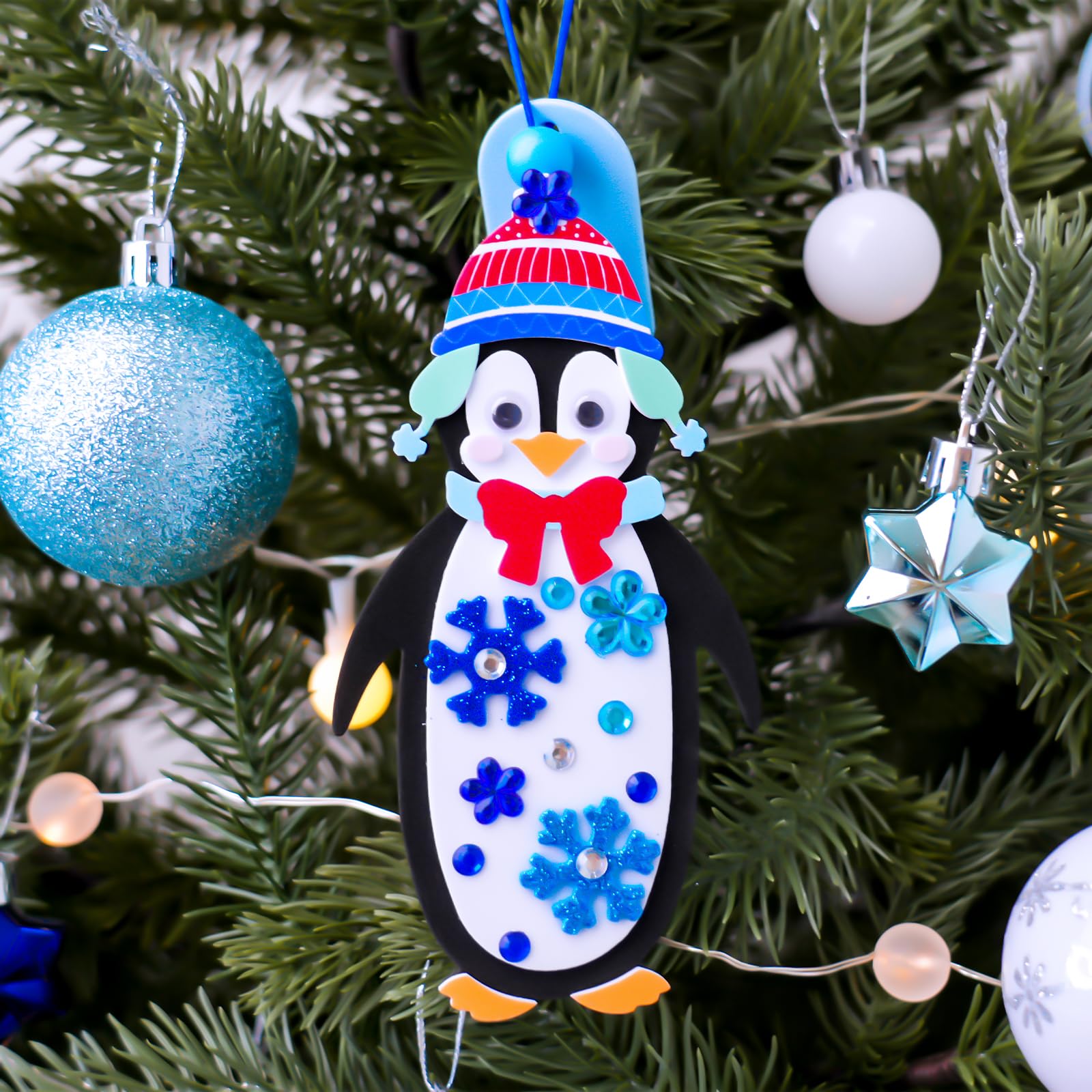Winlyn foam stickers sheet with penguin details for easy decorating.