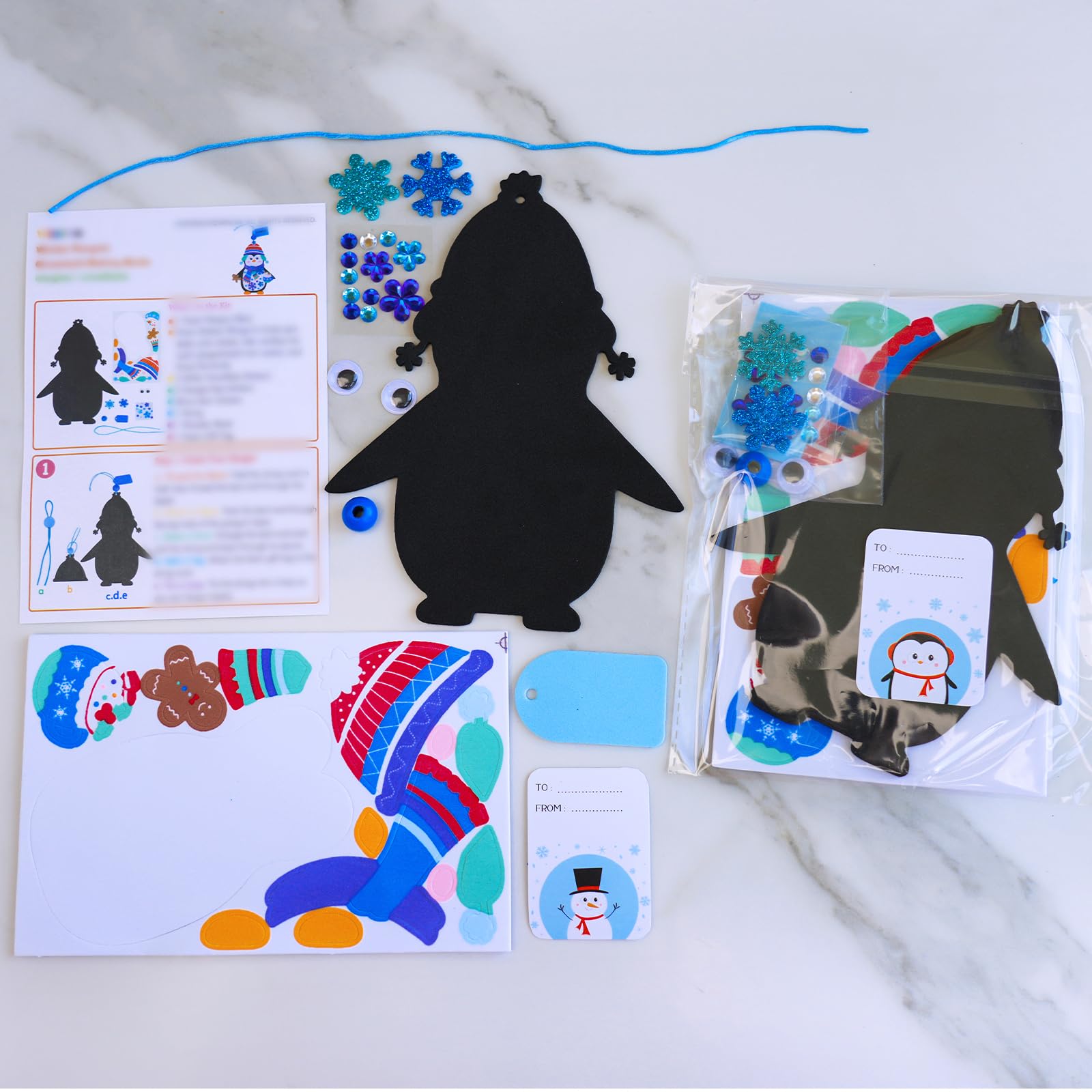 Winlyn glitter snowflake stickers add sparkle to holiday penguin crafts