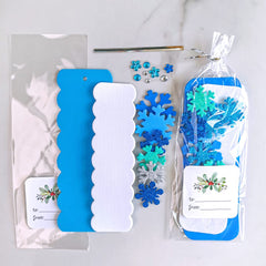 Winlyn self-adhesive snowflake stickers and foam snowflakes for quick crafts.