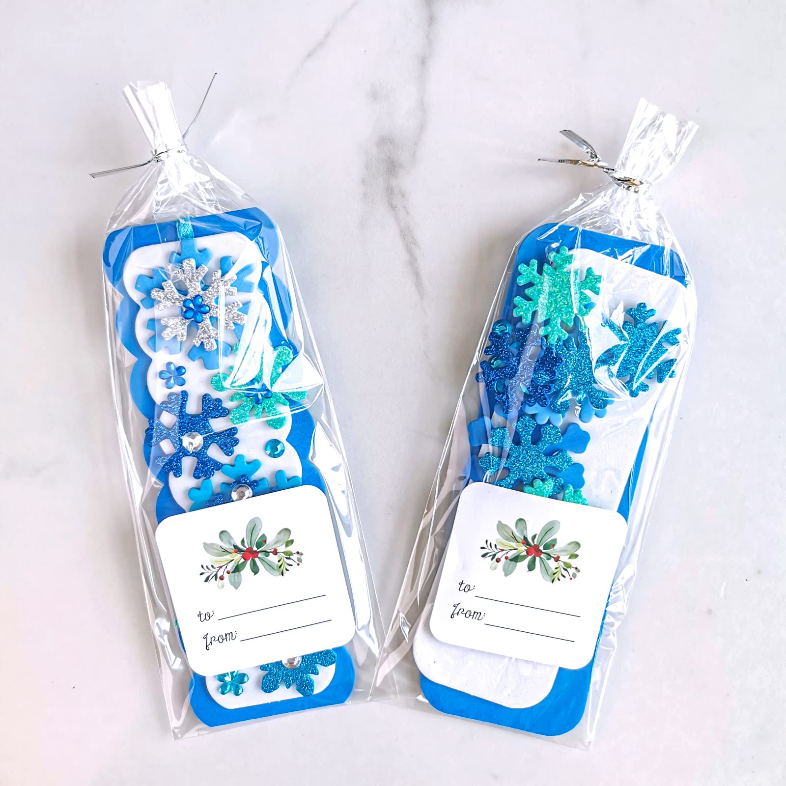 Winlyn glitter foam snowflake stickers in blue and teal for festive accents.
