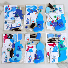 Winlyn blue stocking pieces and glitter snowflakes add wintry sparkle