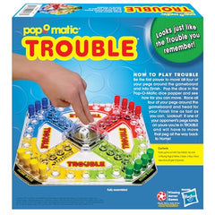 Colored Trouble pegs for 2-4 players ready to race around the board.