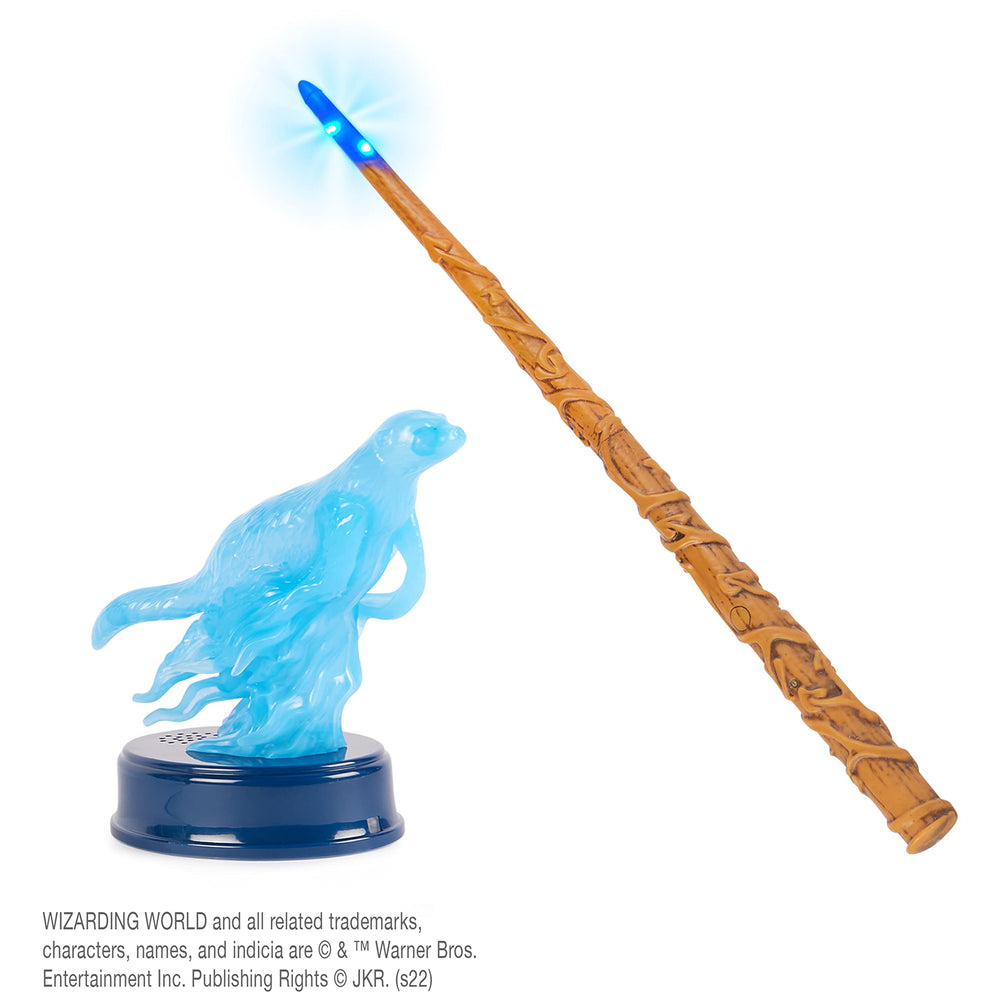 Wizarding World wand lights and sounds respond to movement for interactive spell learning.