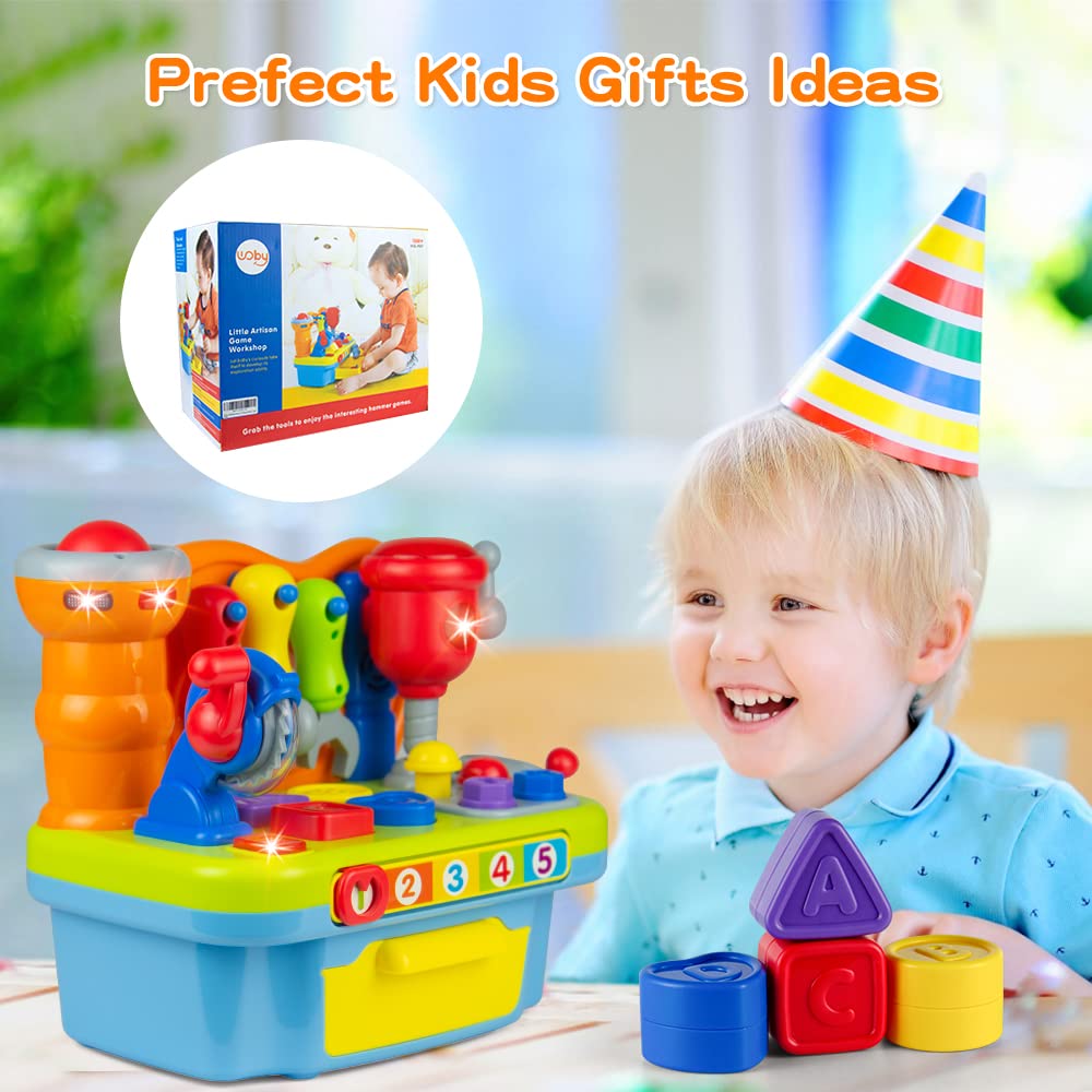 Woby workbench lights and music provide engaging sensory feedback during play.