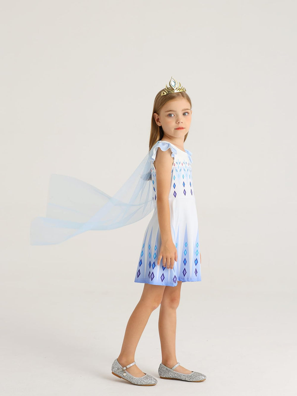 WonderBabe Snow Princess dress side view highlights puffy sleeves and twirl-ready silhouette.