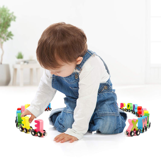 Wondertoys alphabet train cars connected by magnets for longer sequences.