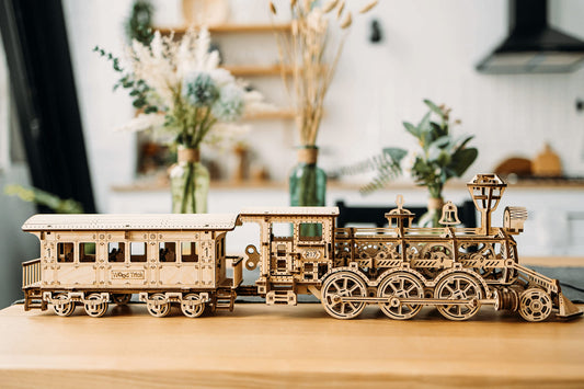 Wood Trick locomotive doors open and steps move for interactive play.