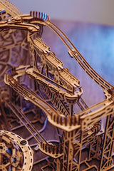 Wood Trick Marble Run three tracks converge, creating planetary motion feel for curiosity.
