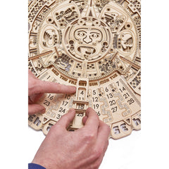 Wood Trick Mayan calendar movable-pattern panel demonstrates interactive mechanics for curiosity and learning.