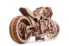 Wood Trick motorcycle seat area with push-start feature shown for interactive use.