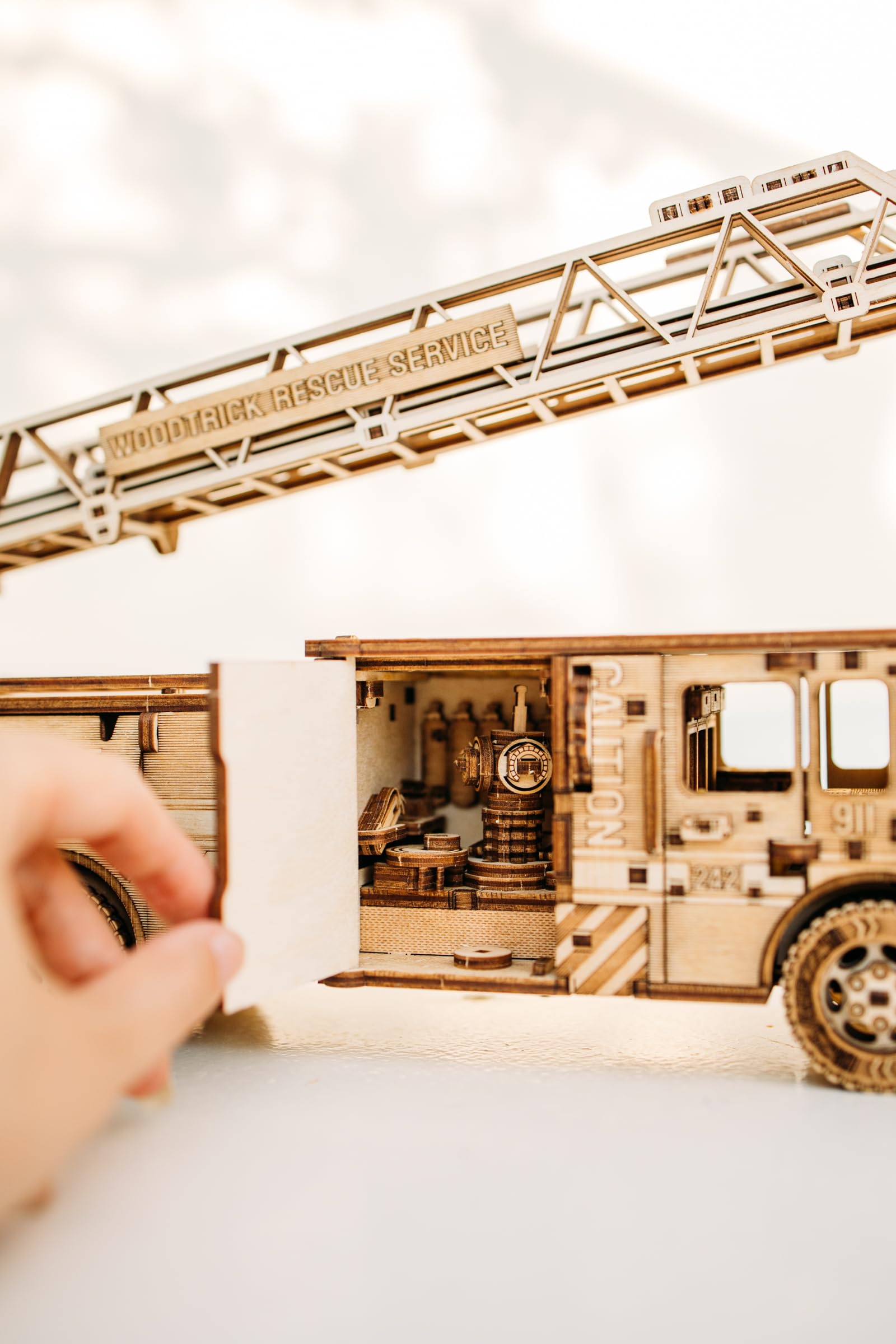 Wood Trick Rescue Firetruck cabin detail highlights authentic-looking driver's area for realism in builds.
