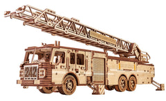 Wood Trick Rescue Firetruck movable shows a detailed wooden model with a functional ladder.