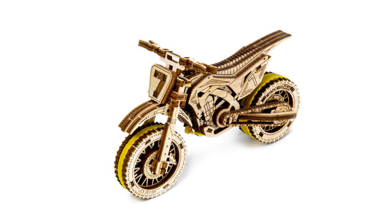 WOODEN.CITY Motocross 3D Puzzle in-progress pieces showcase crafting excitement.