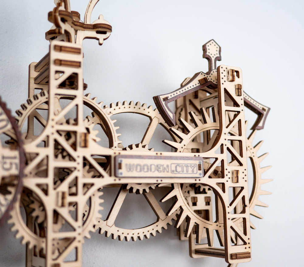 WOODEN.CITY pendulum in motion for tactile steampunk charm on display.