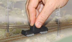 Woodland Scenics Tidy Track Cleaning Kit side view with tools.