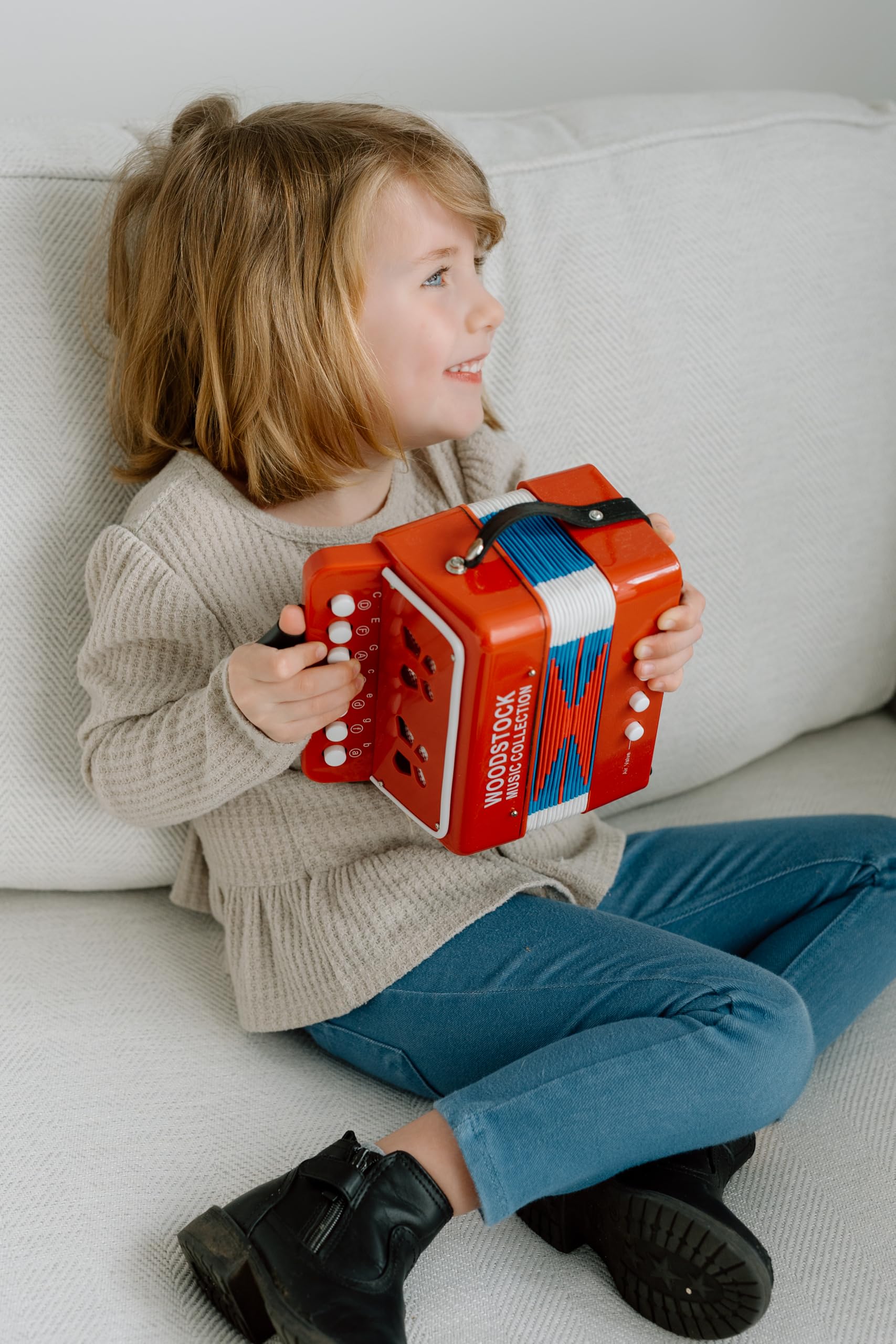 Woodstock Chimes Kid's Accordion 7in red, keys view, easy learning supports early musical exploration.