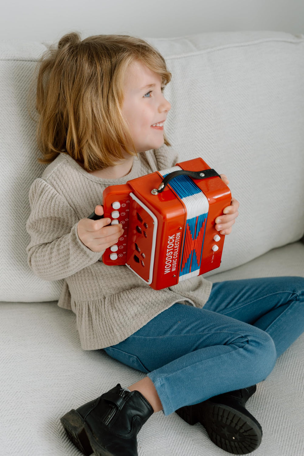 Woodstock Chimes Kid's Accordion 7in red, keys view, easy learning supports early musical exploration.