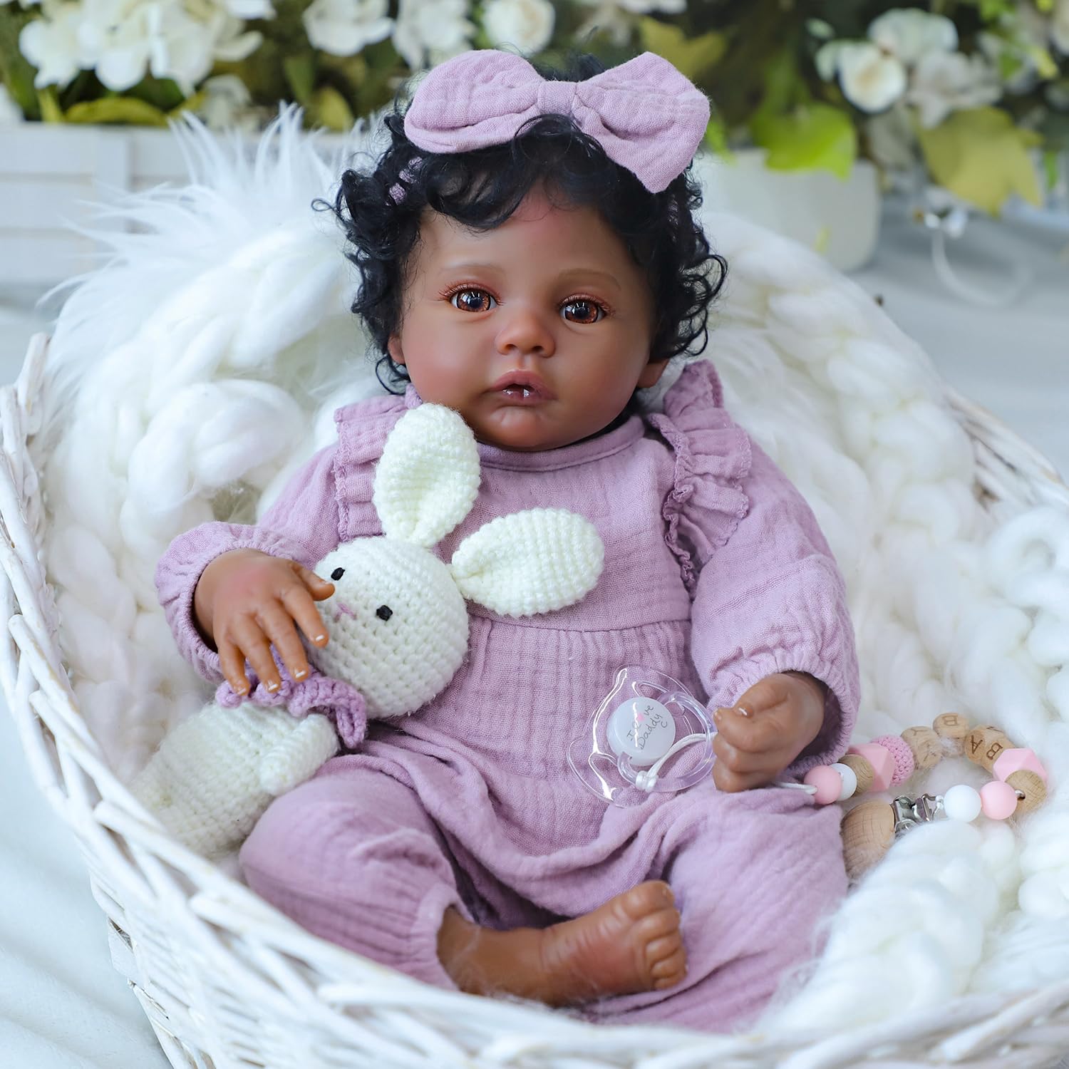 WOOROY Realistic Reborn Baby Doll 18-inch pink jumpsuit for adorable outfit styling