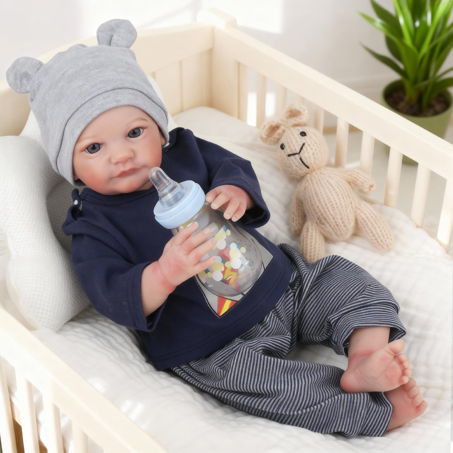 WOOROY Reborn Boy Doll 19in with soft cloth body for cuddling.