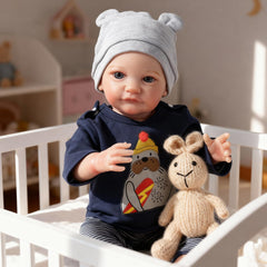 WOOROY Reborn Boy Doll with vinyl limbs for lifelike holding.