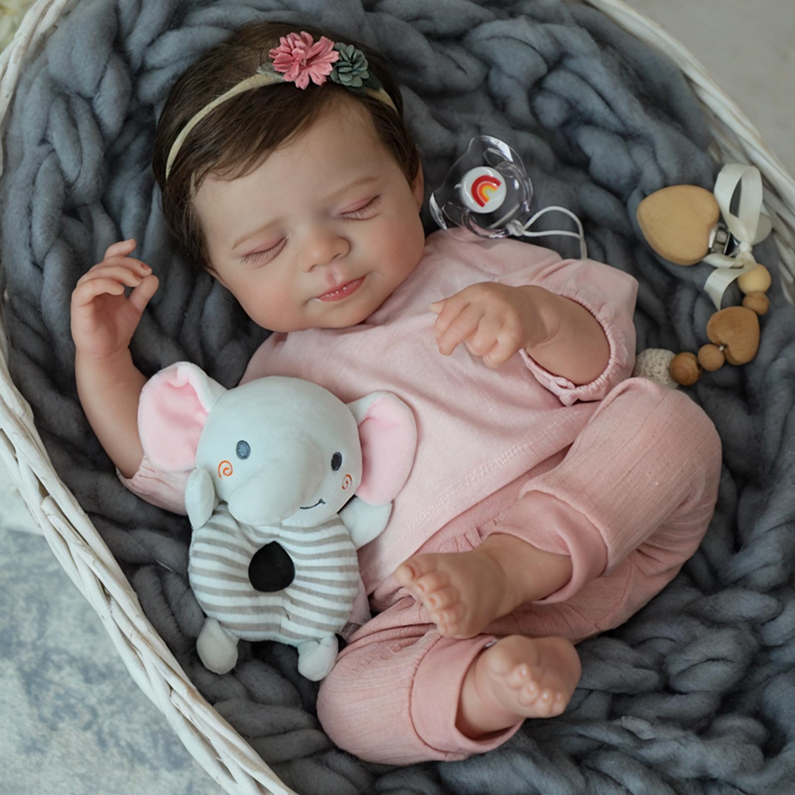 WOOROY dress-ready doll wearing real newborn outfits for styling