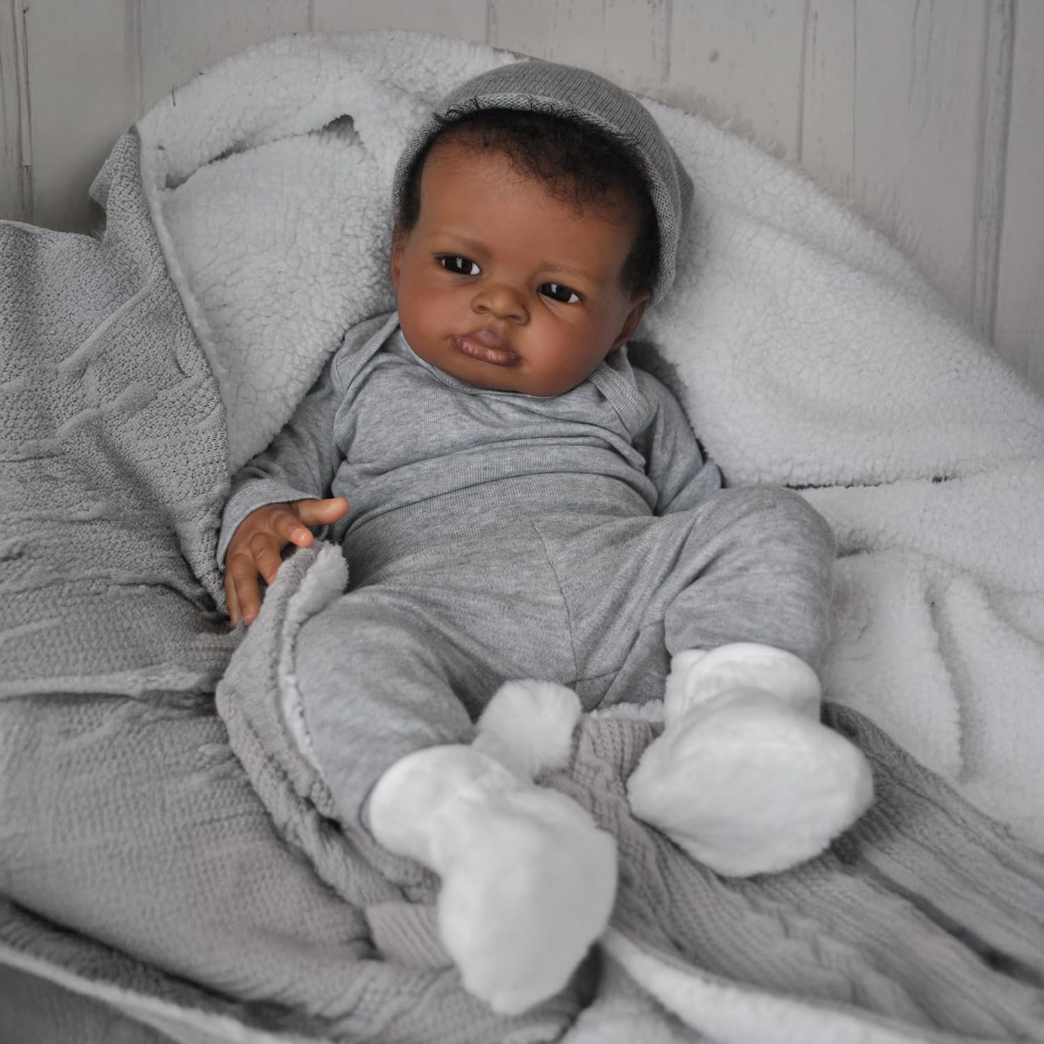 WOOROY reborn doll 20-inch black boy face detail for imaginative play and nurturing.