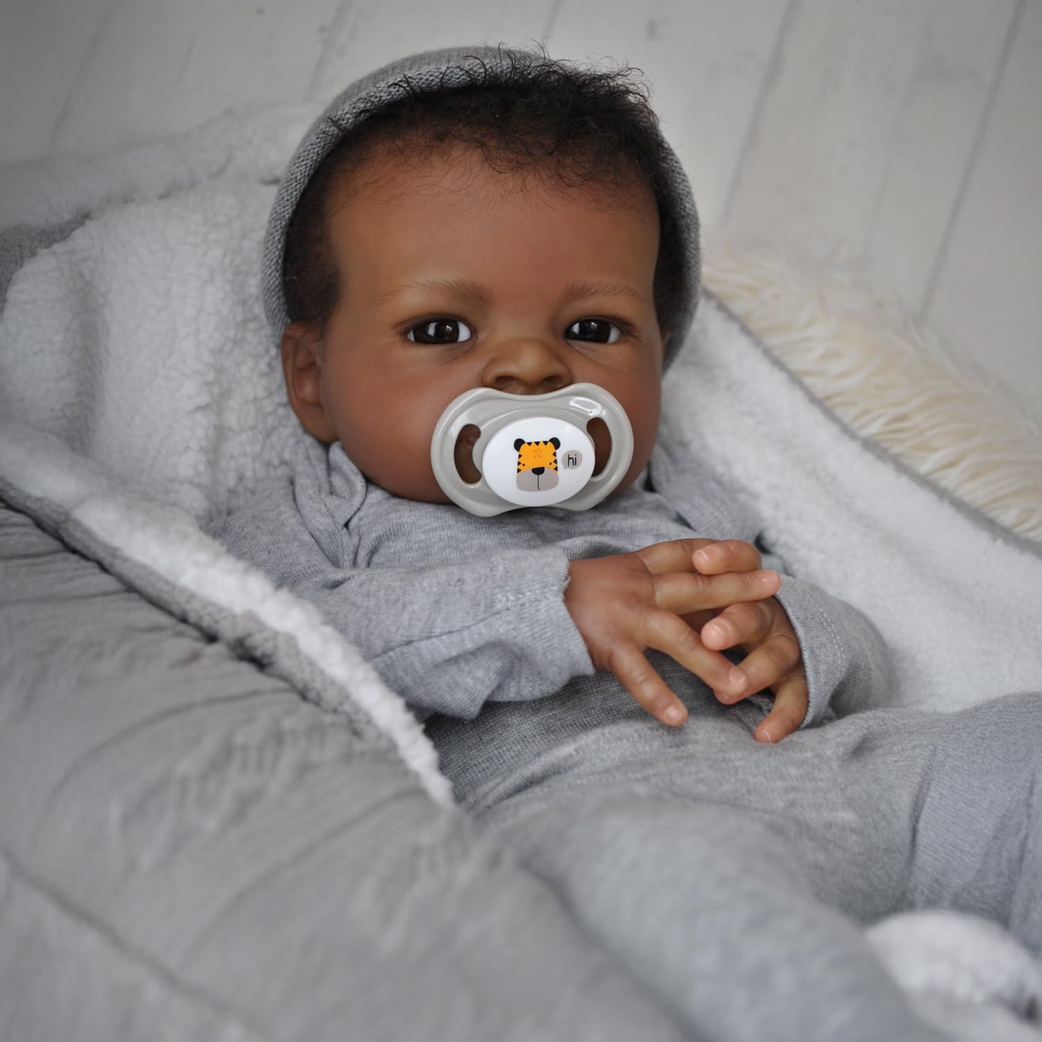 WOOROY reborn doll 20-inch full body highlight weighted feel for realistic handling.