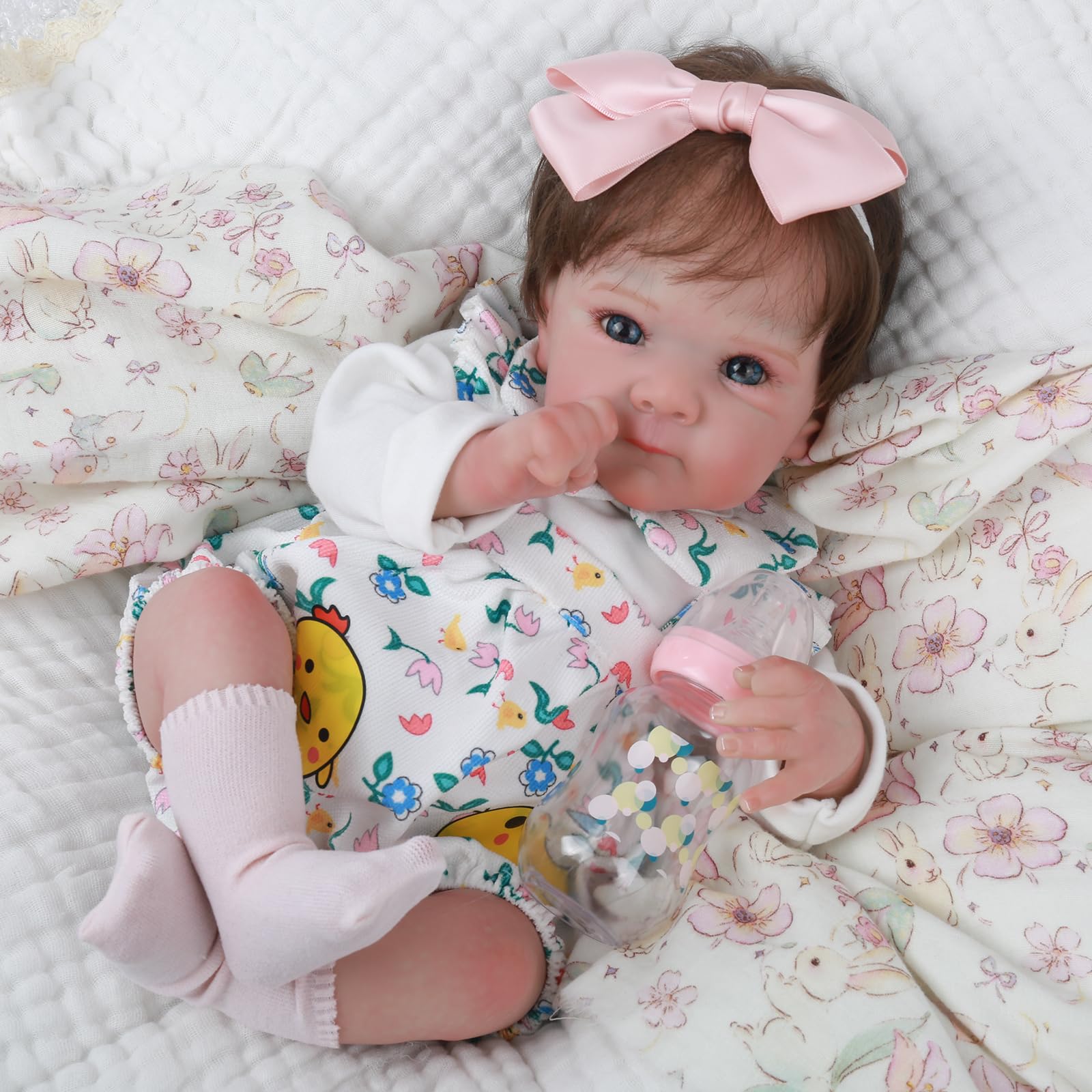 WOOROY Reborn with rooted hair ready for natural styling and realistic newborn look.