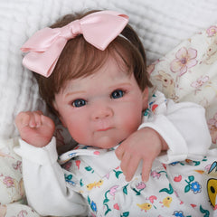 WOOROY Reborn weighted cloth body providing secure handling and lifelike posture.