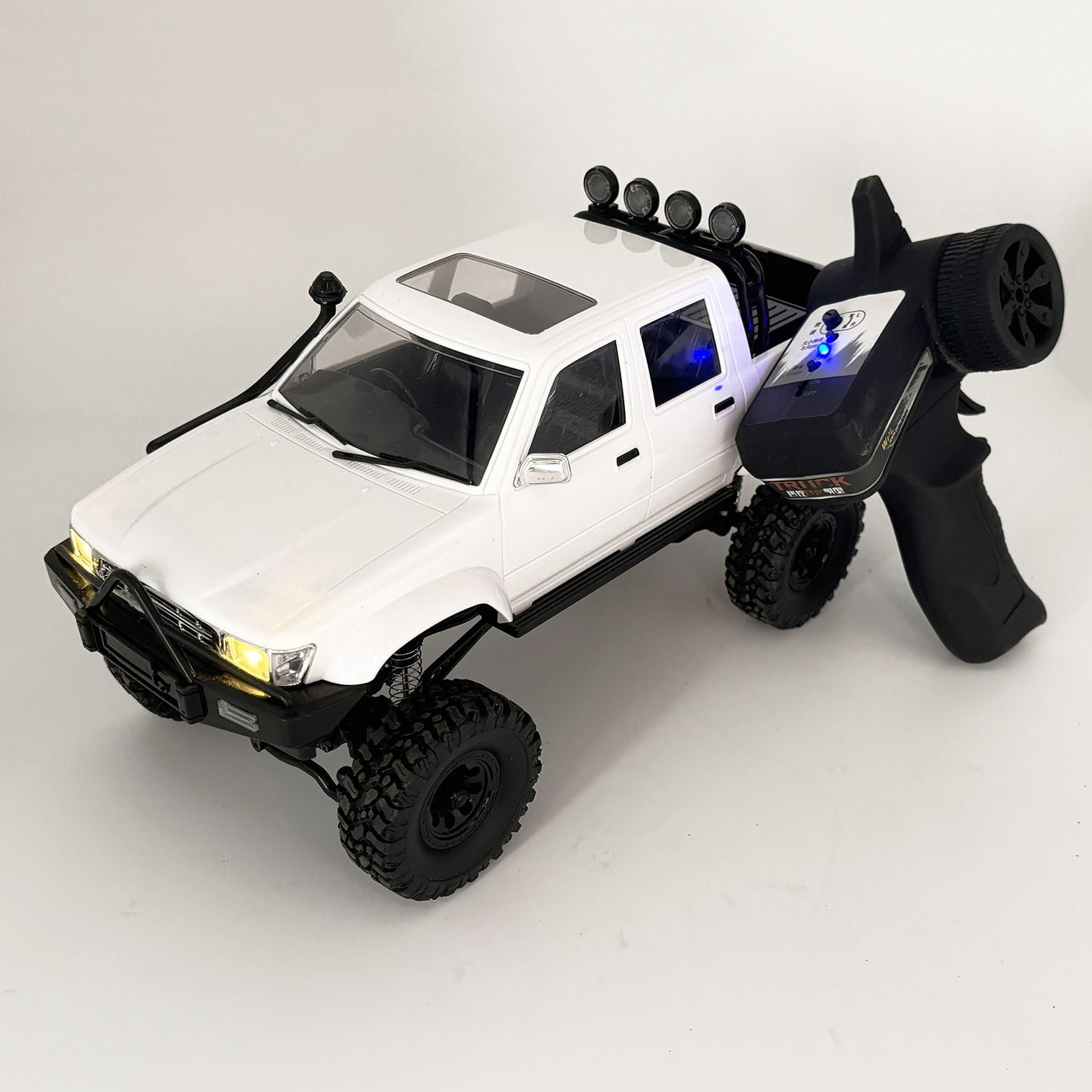 WPLDEWAN WPL C64-1 RTR off-road chassis in rugged terrain for realism.