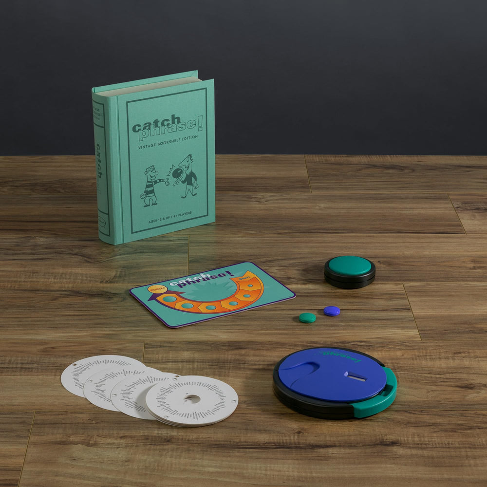 WS Game Company Catch Phrase sixteen double-sided disks ready for prompts.