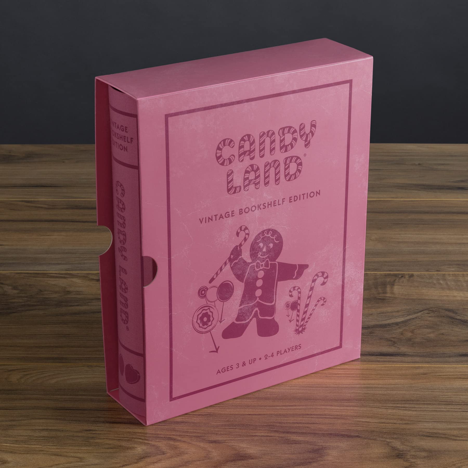 WS Game Company Chutes and Ladders bookshelf case showing integrated storage in a compact frame.