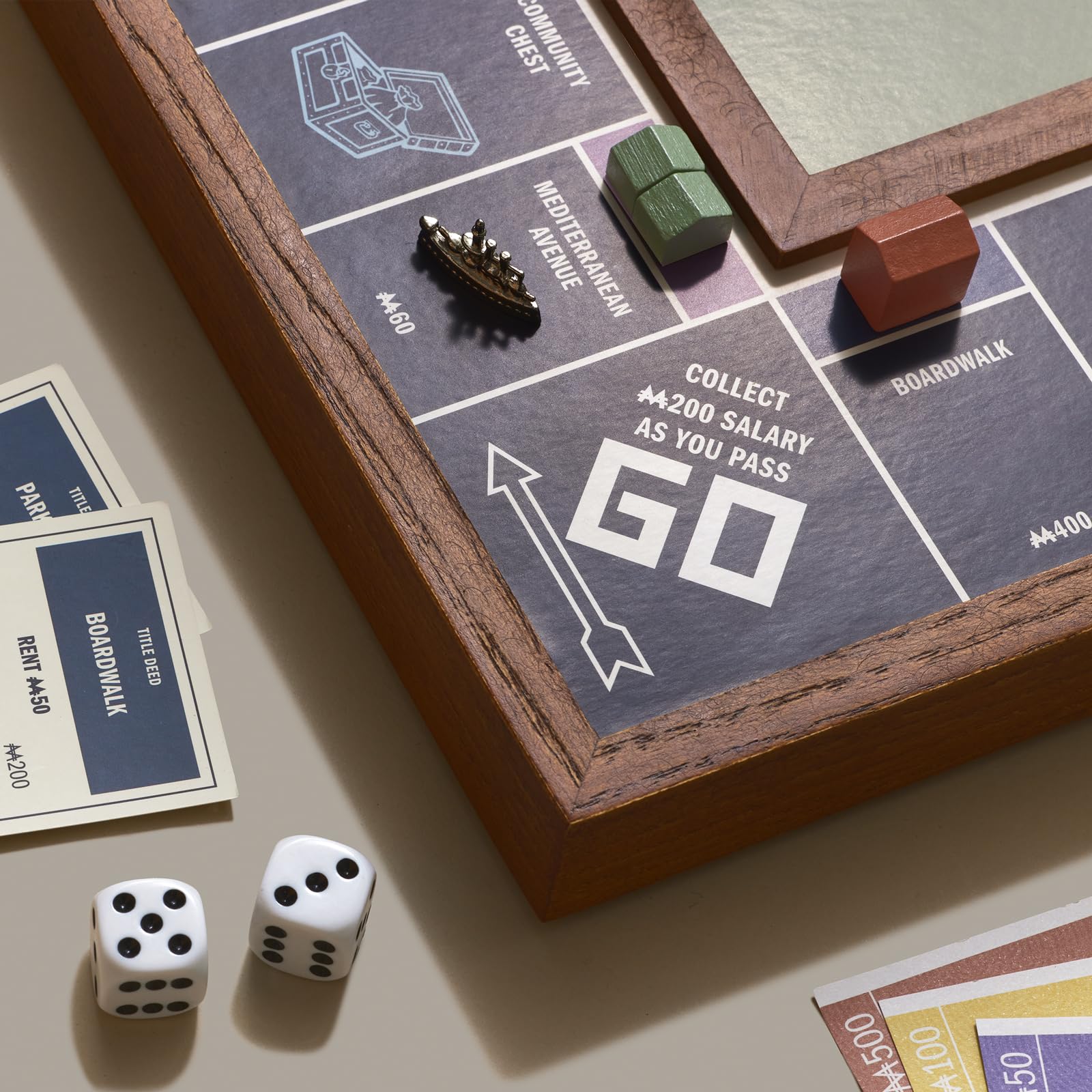 WS Game Company Monopoly Grand molded tray keeps money, cards, and tokens organized.