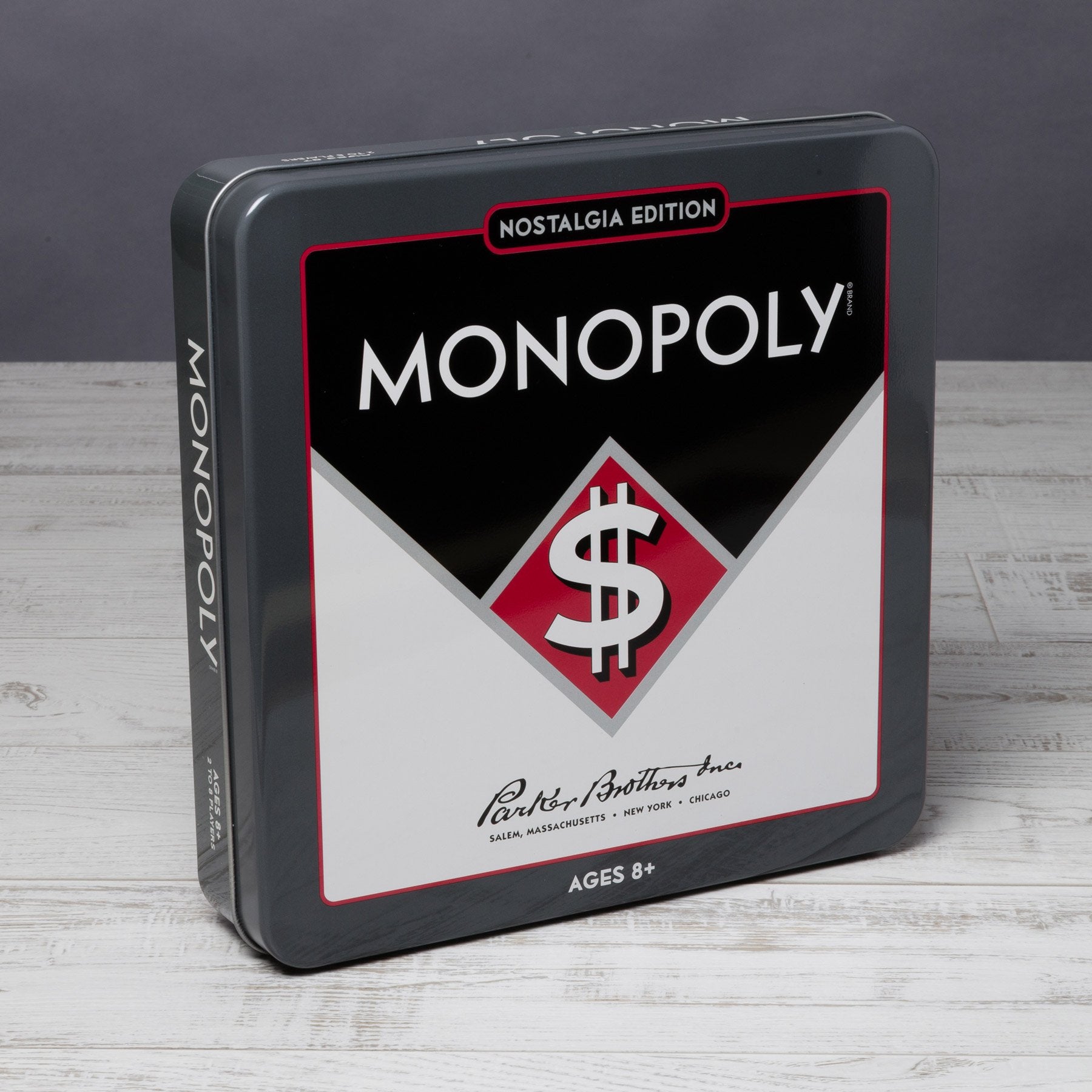 WS Game Company Monopoly Nostalgia Edition tin serves as a timeless centerpiece for family game nights